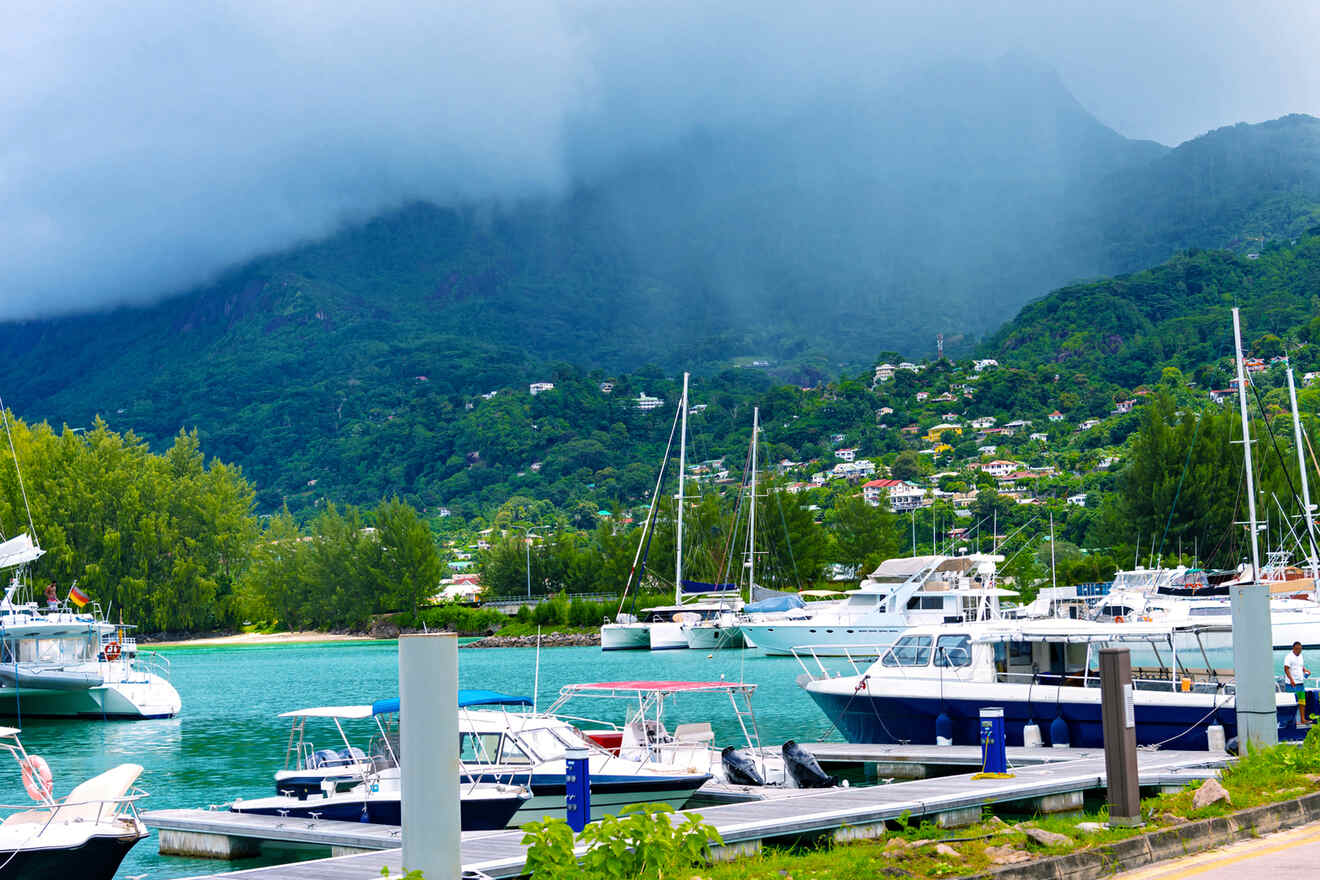 Boats floating in blue water in Mahe the best place where to stay in Seychelles